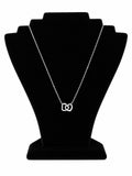 COLLAR PLATEADO CON DIJE DOS CORAZONES CRUZADOS